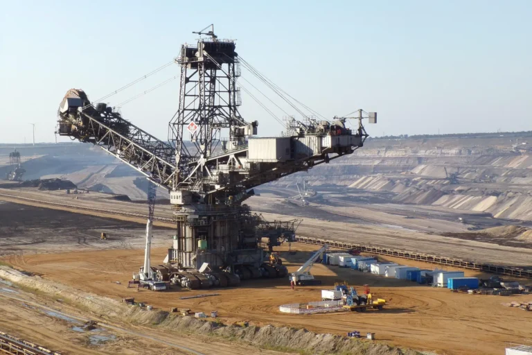 open cast mining showing heavy equipment in the background